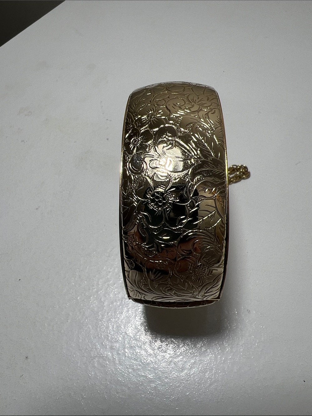Engraved Floral Gold Tone Hinged Bangle Bracelet